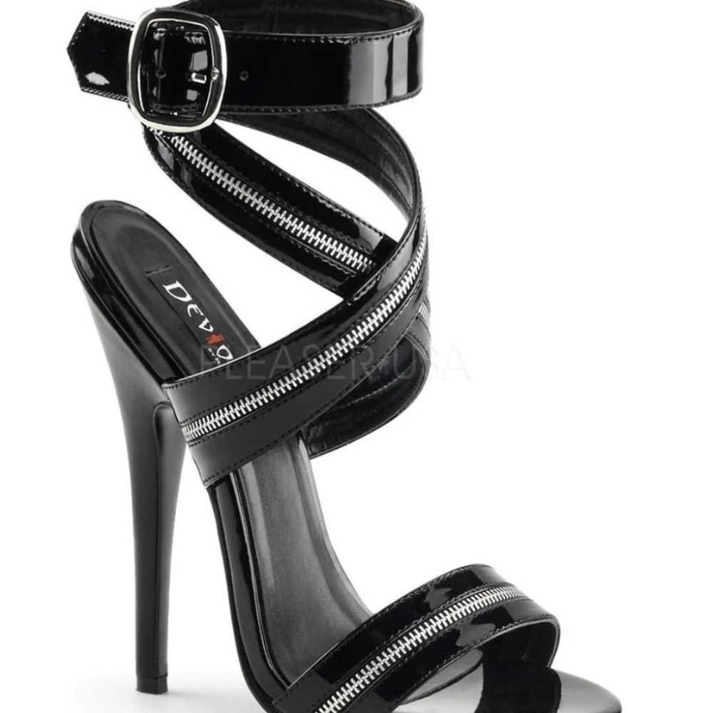 Never worn Devious black patent leather heels